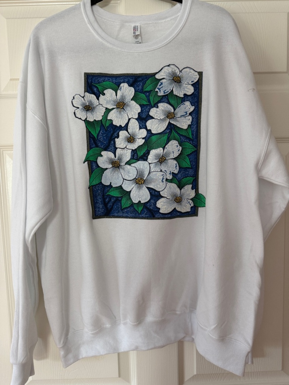 White Sweatshirt with Floral Panel
